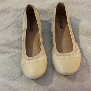 Kim Rogers beige shoes.